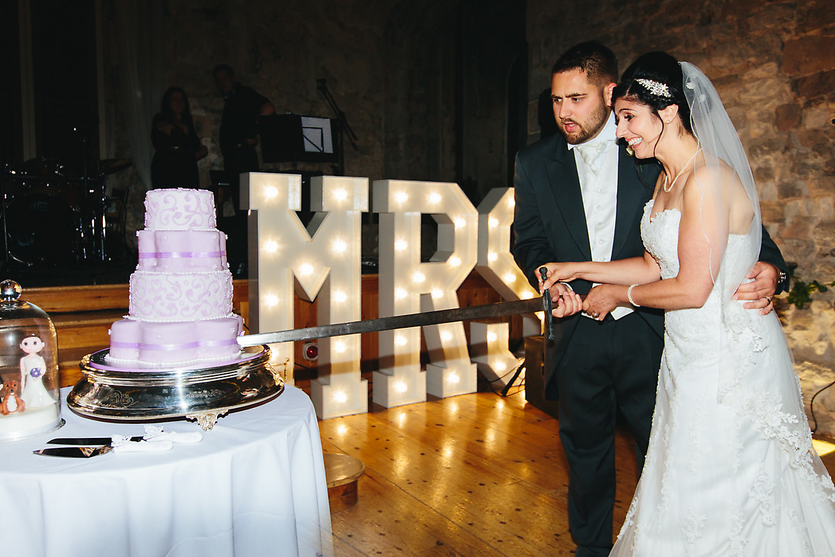 Lulworth Castle Wedding cake cutting