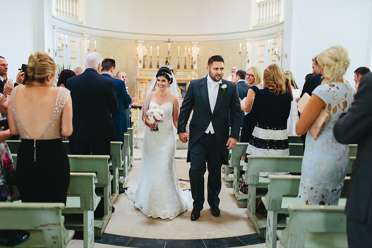Newly married exit the church