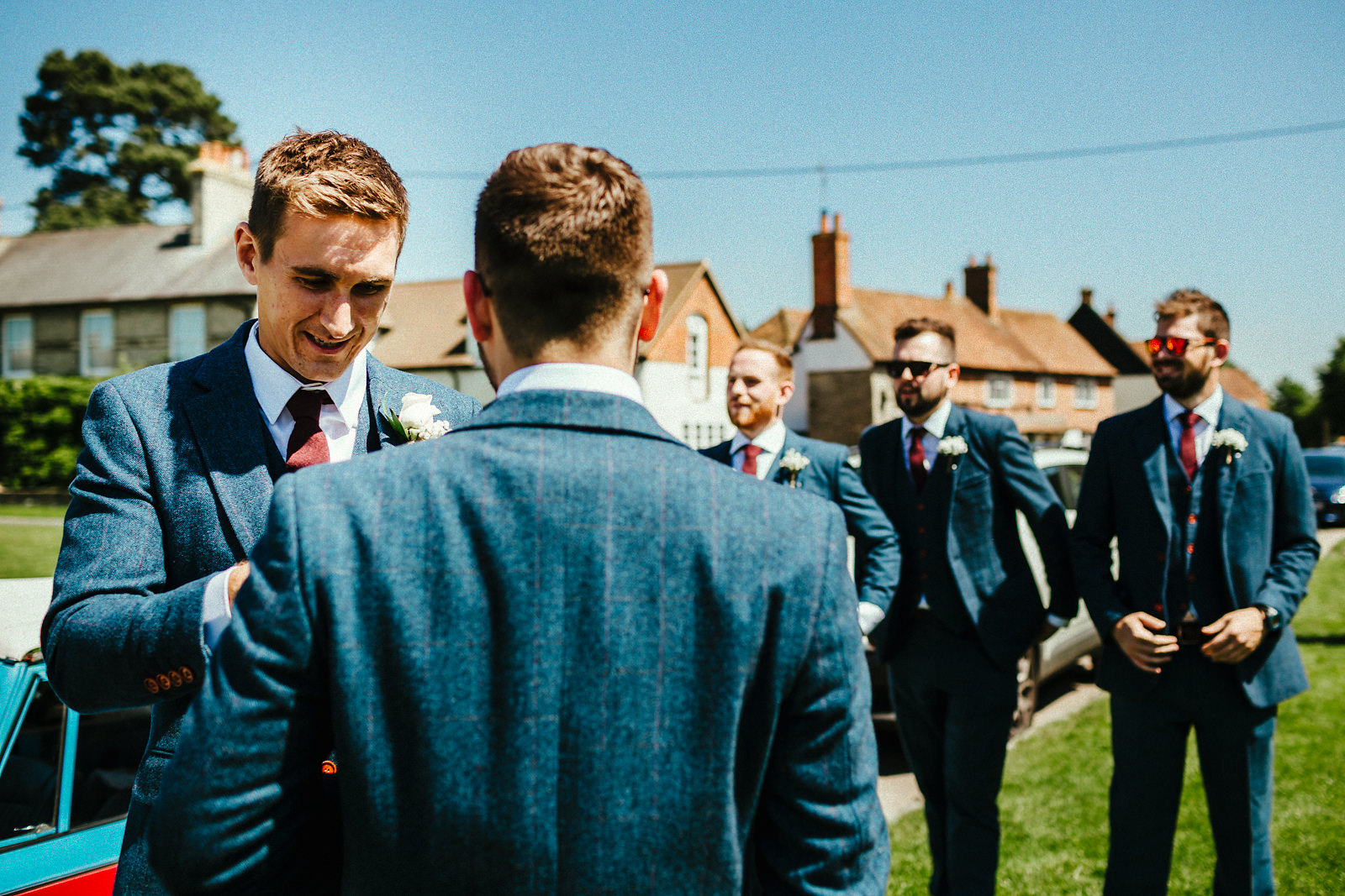 Groomsmen getting ready for church ceremony